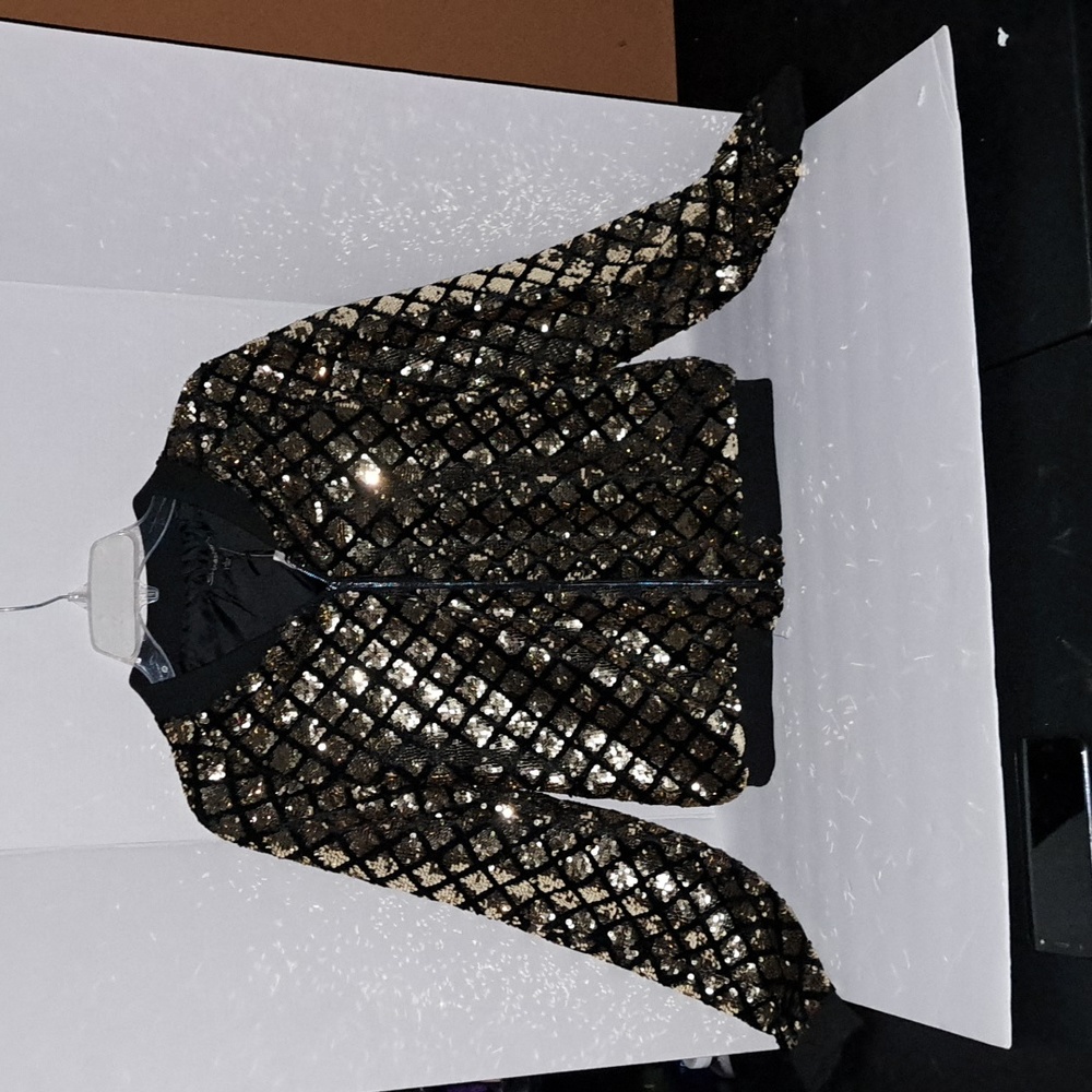 Shinestar Collections sequence jacket. BLACK AND GOLD
